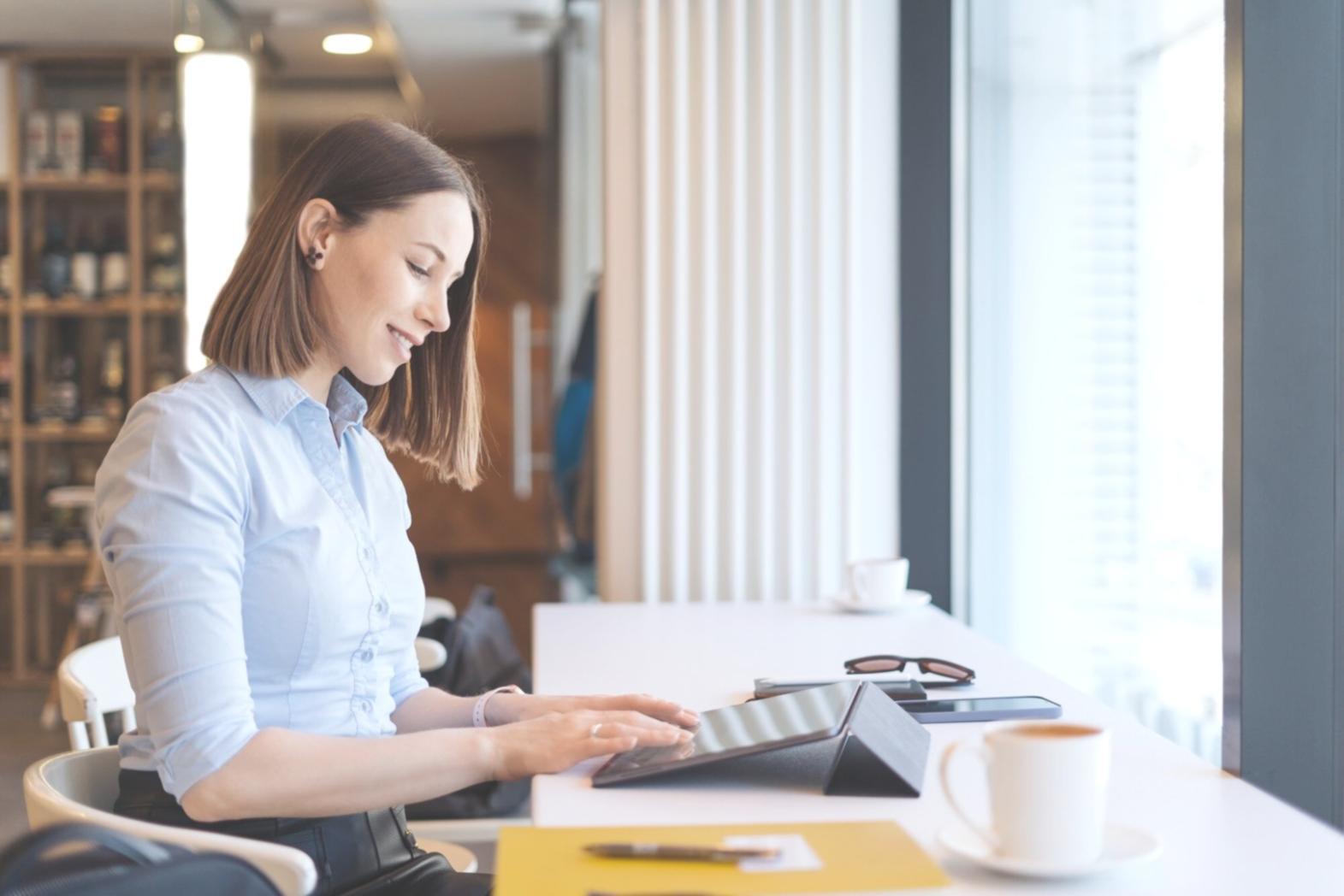 Entrepreneur reviewing financial reports and budget analysis
